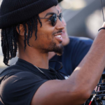 Black British filmmaker directing a film